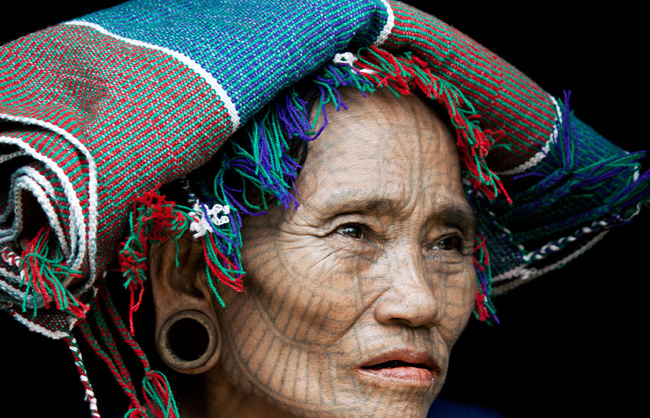 Spider web tattooed Chin Woman from Rakhine State