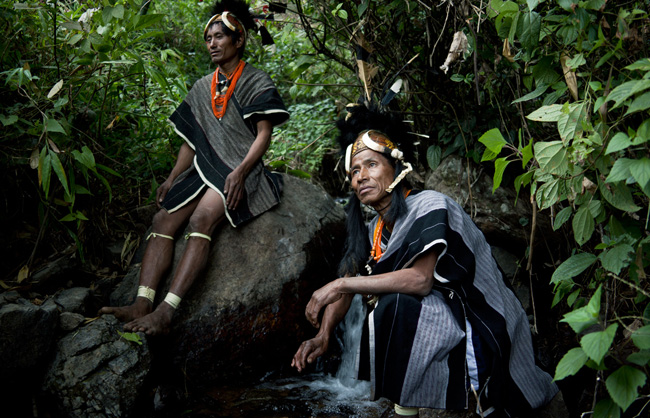 Heimi Naga warriors from the village of Niansao refreshing themselves at the river.