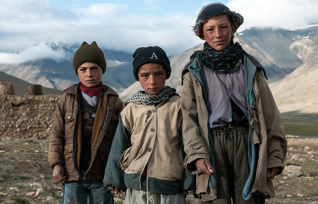 The difficult living conditions of the Pamir take a toll on the skin of the Wakhi children and reveal all the time they already spent laboring outside. Big Pamir - Afghanistan - 2014
