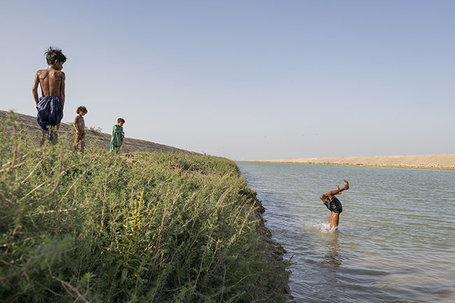 In the polluted waters of the Right Bank Outfall Drain (RBOD), children play, dive, and swim. Some develop skin rashes, others digestive issues. No dispensary nearby. The price of staying here is very high.